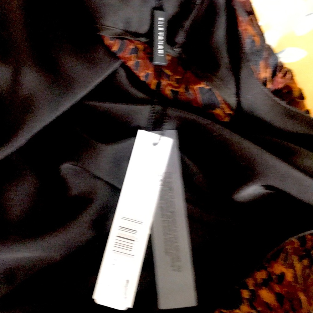 Beautiful, comfortable, all occasion Elie Tahari dress. new with tag, size 8.